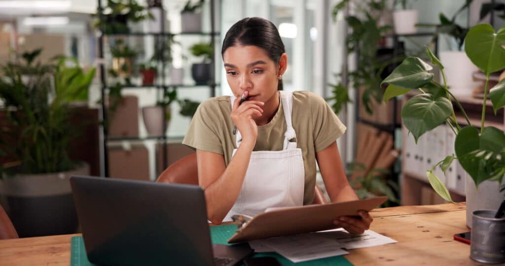 a lady looking at HR policies for her small business